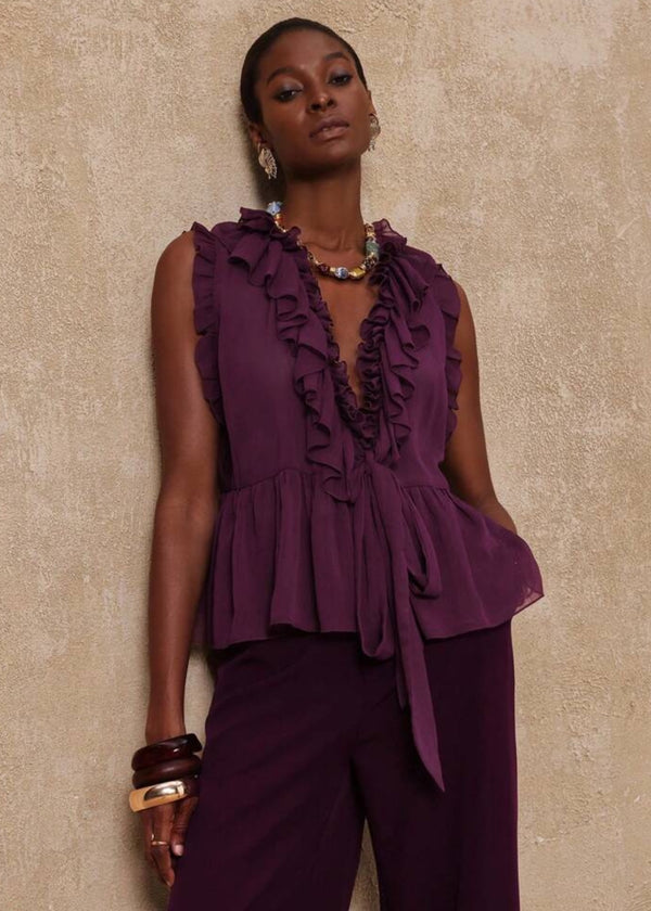 Sleeveless Ruffle Neckline Peplum Waist Blouse